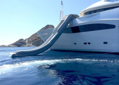 Inflatable slide for yacht