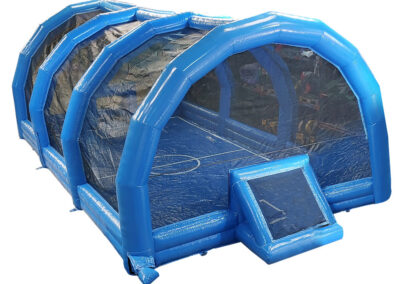 Inflatable football pitch covered
